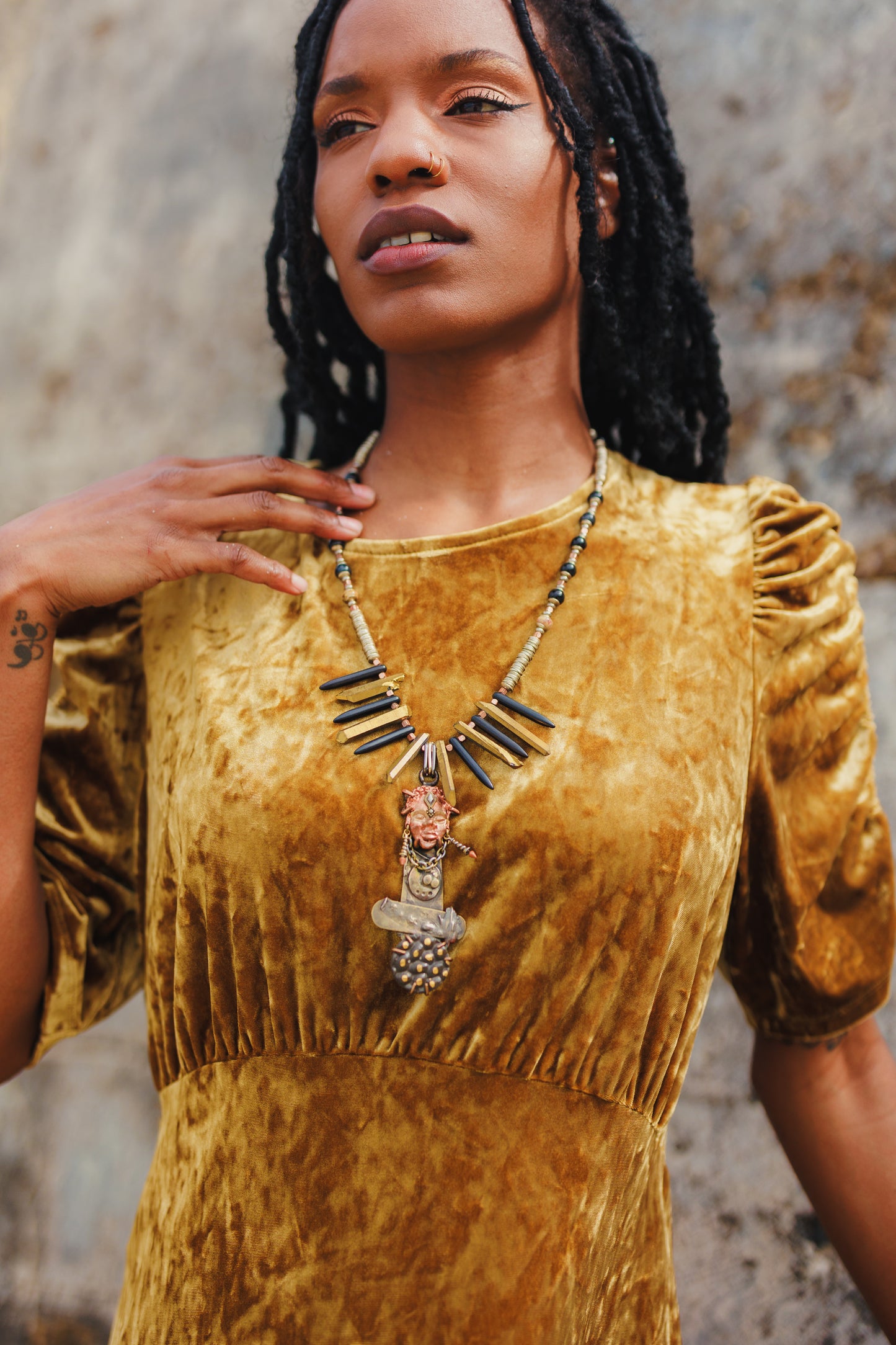Woman wearing The Awakened Soul Necklace