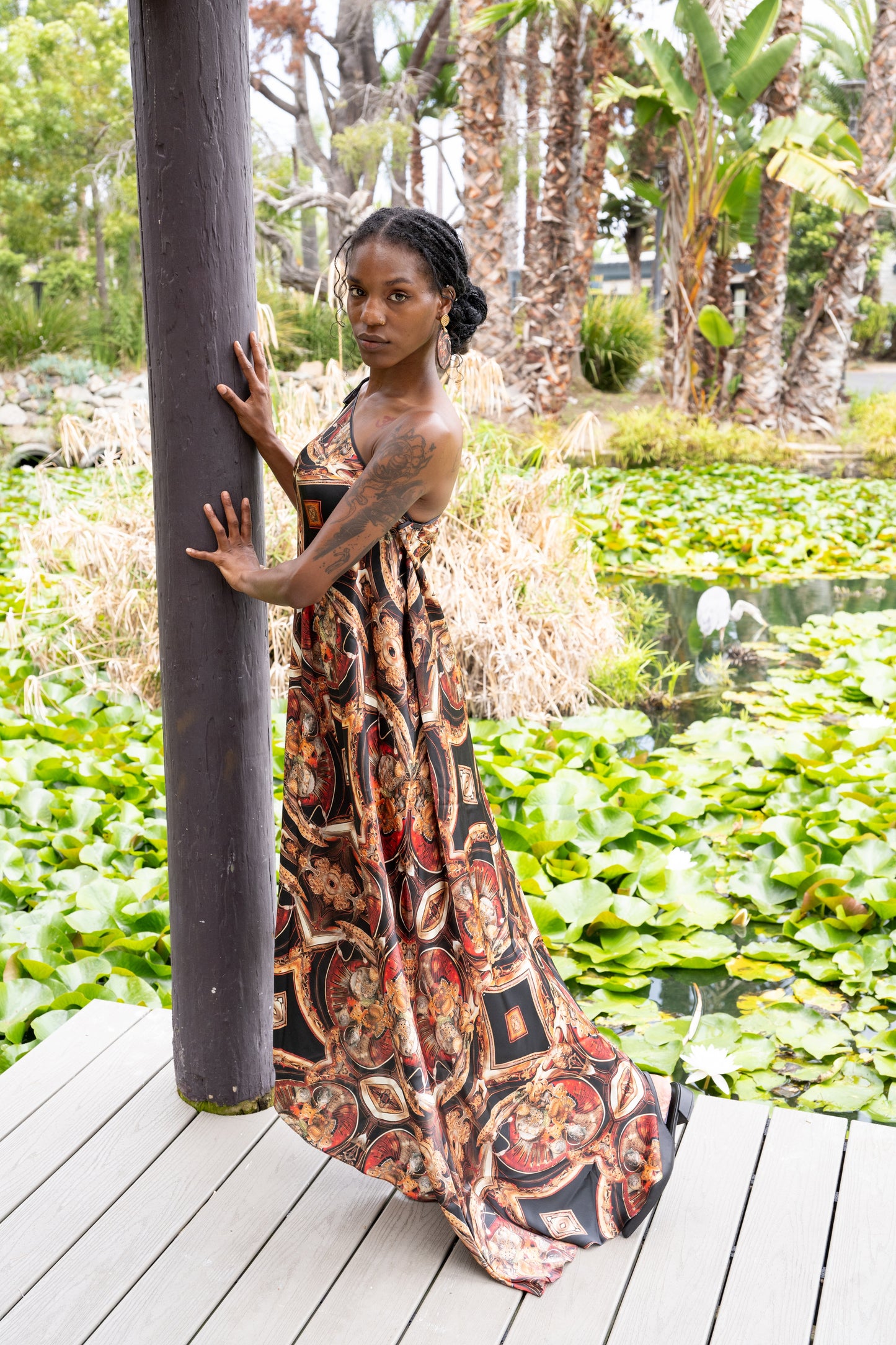 Woman wearing The Heze Halter Dress