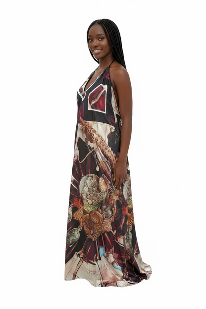 Woman wearing Machina Afrofuturism Halter Dress on a white background