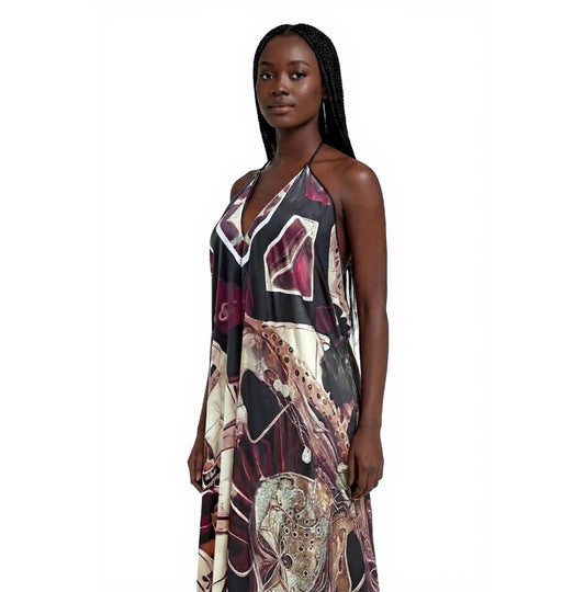 Woman wearing Machina Afrofuturism Halter Dress on a white background