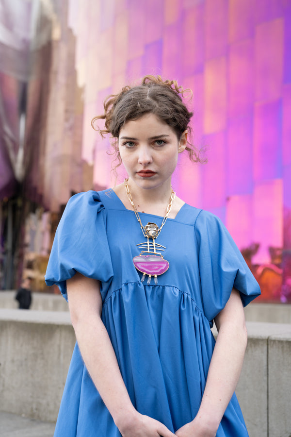 Woman wearing Spica Necklace