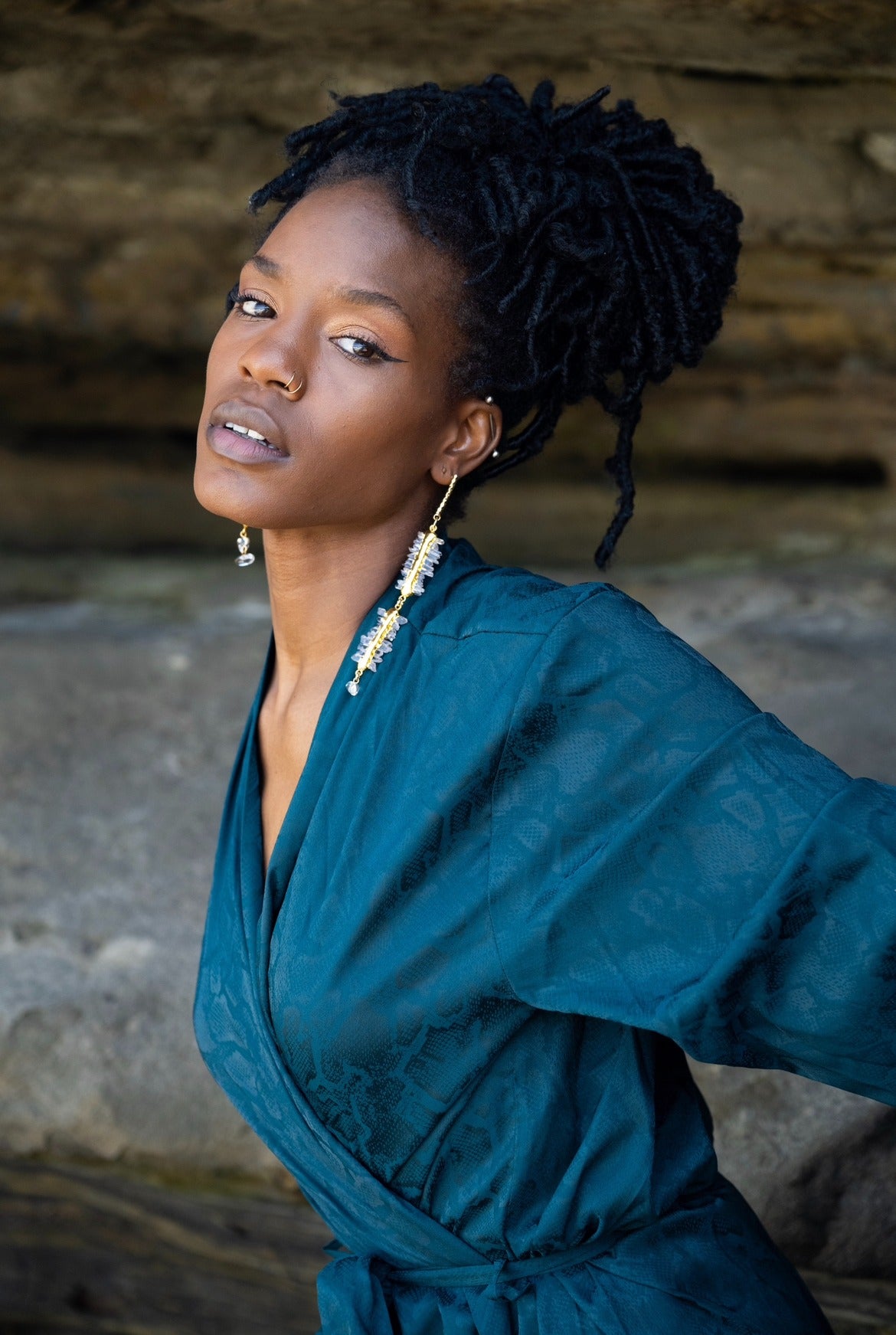 Woman wearing Lyra Earrings