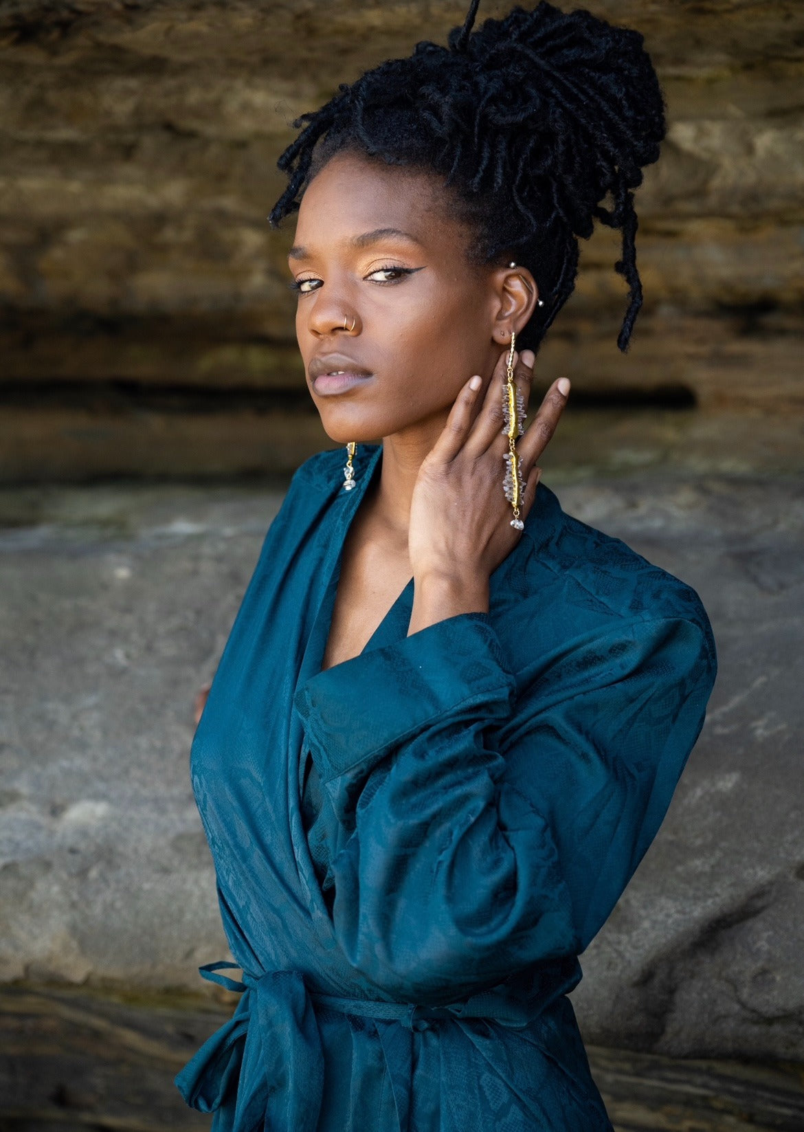 Woman wearing Lyra Earrings