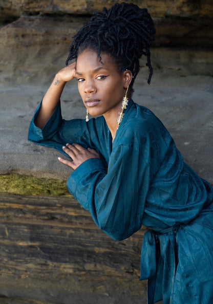 Woman wearing Lyra Earrings