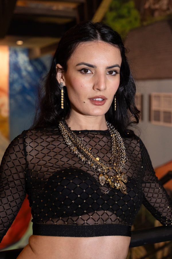 Woman wearing Star of a Story Necklace