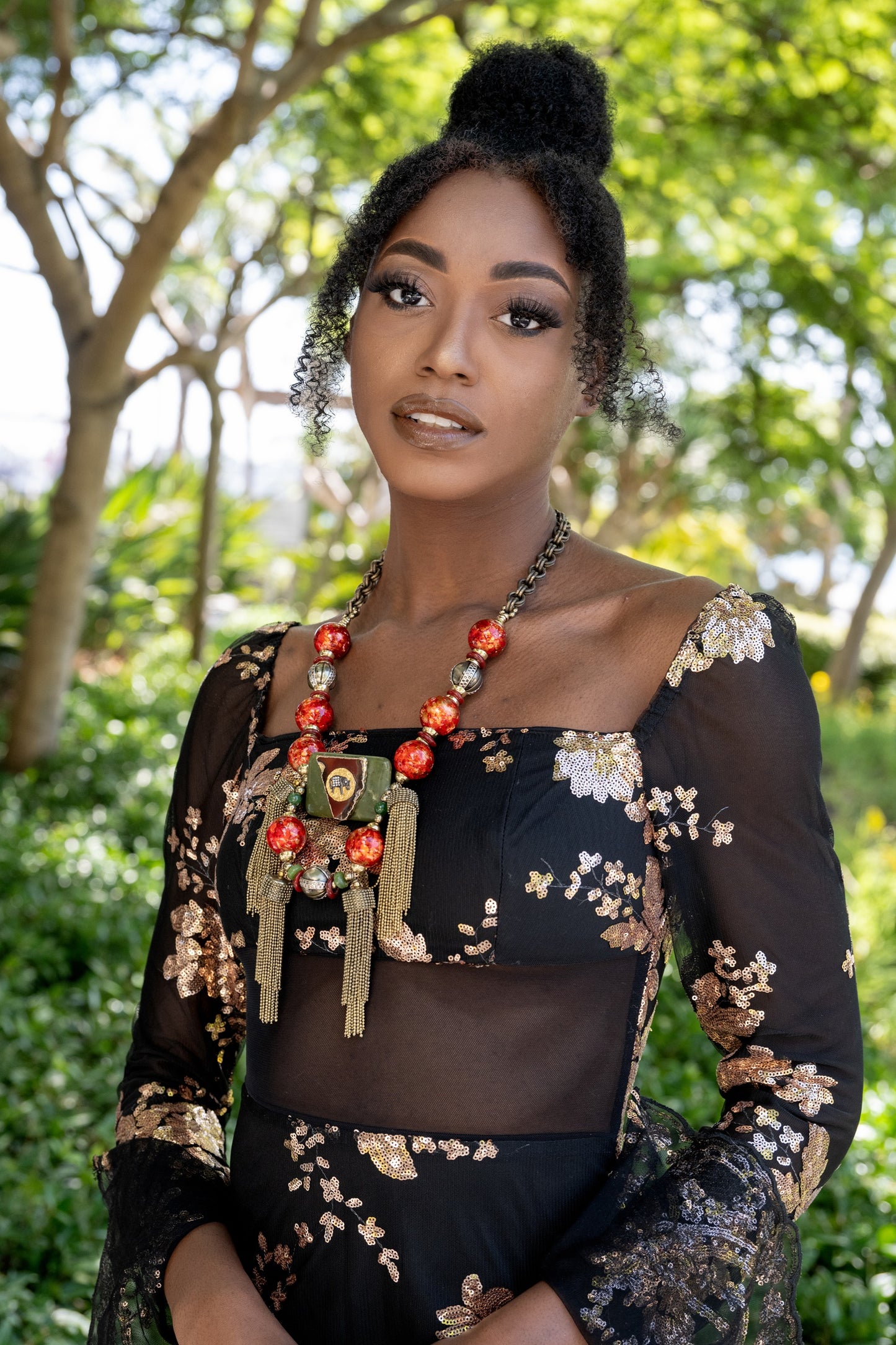 Woman wearing Tembo Tassel Necklace