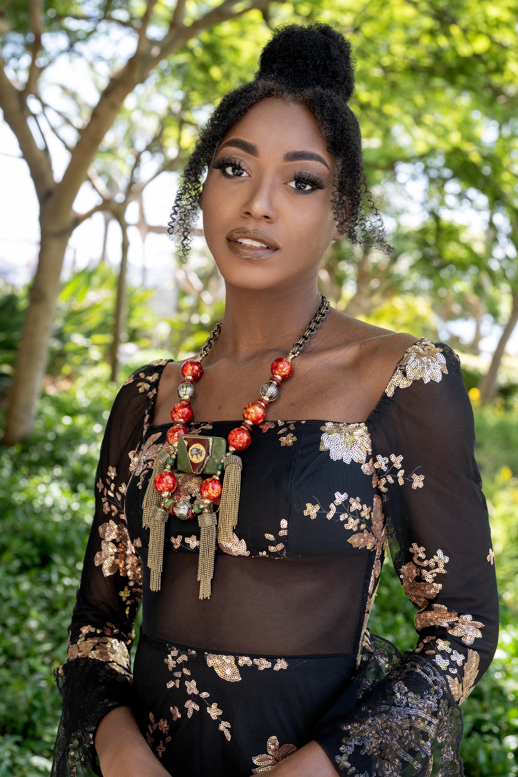 Woman wearing Tembo Tassel Necklace