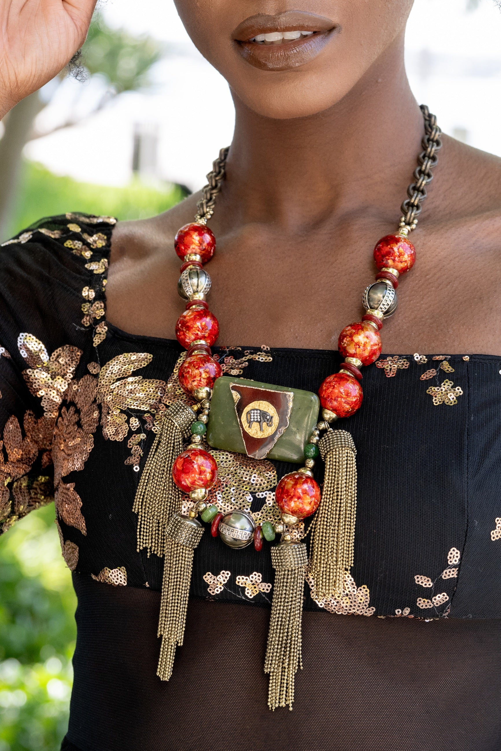 Woman wearing Tembo Tassel Necklace